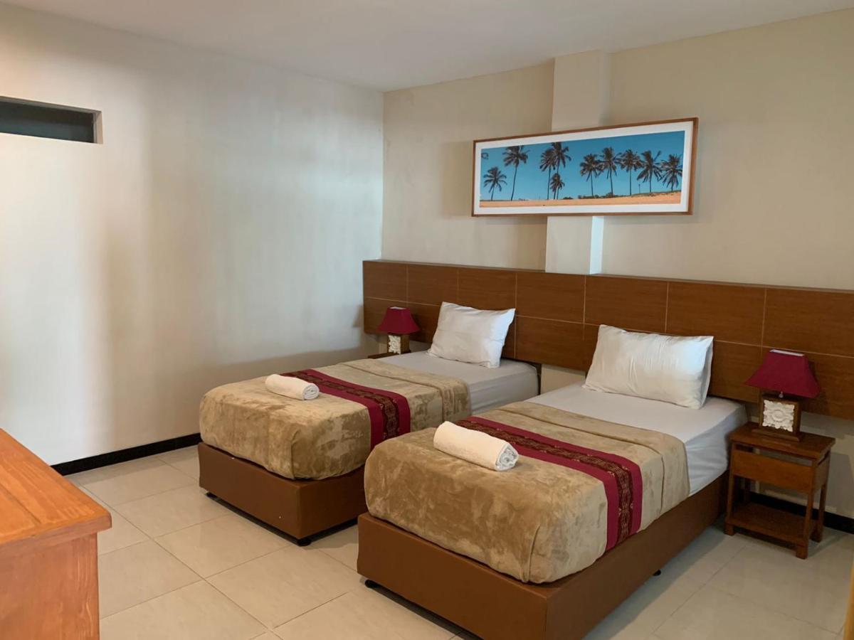 Kuta Suci Guest House Extérieur photo
