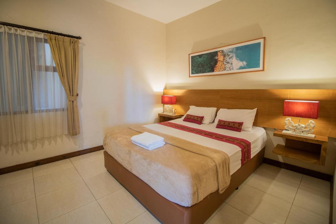 Kuta Suci Guest House Extérieur photo