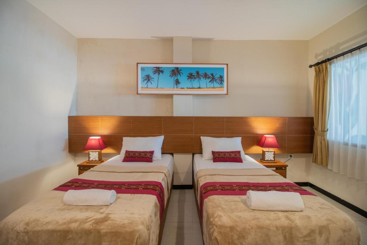 Kuta Suci Guest House Extérieur photo