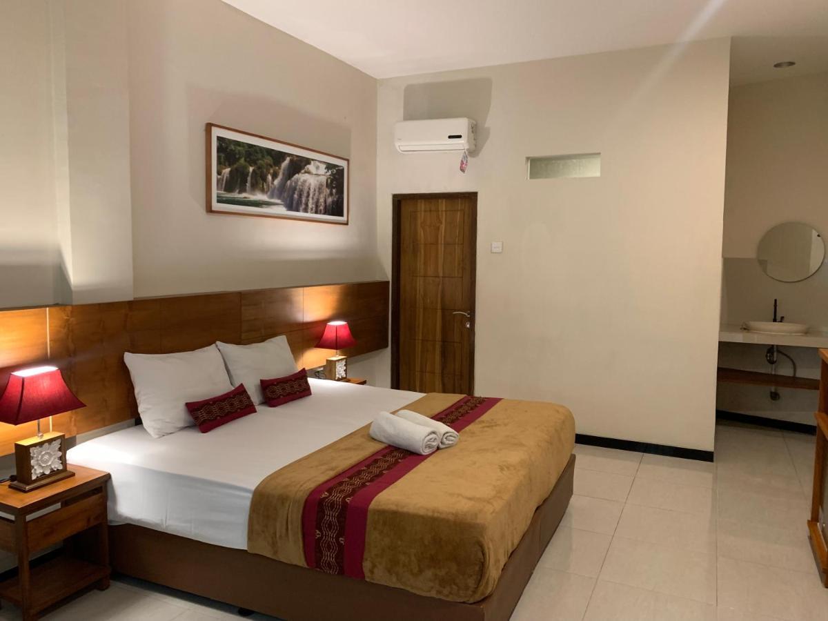 Kuta Suci Guest House Extérieur photo