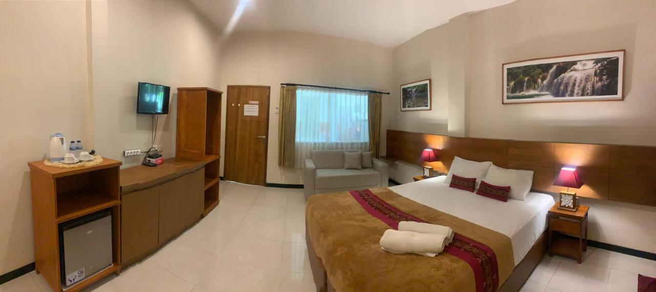 Kuta Suci Guest House Extérieur photo