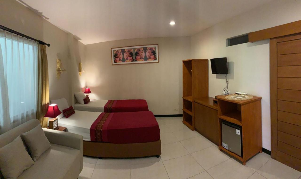 Kuta Suci Guest House Extérieur photo