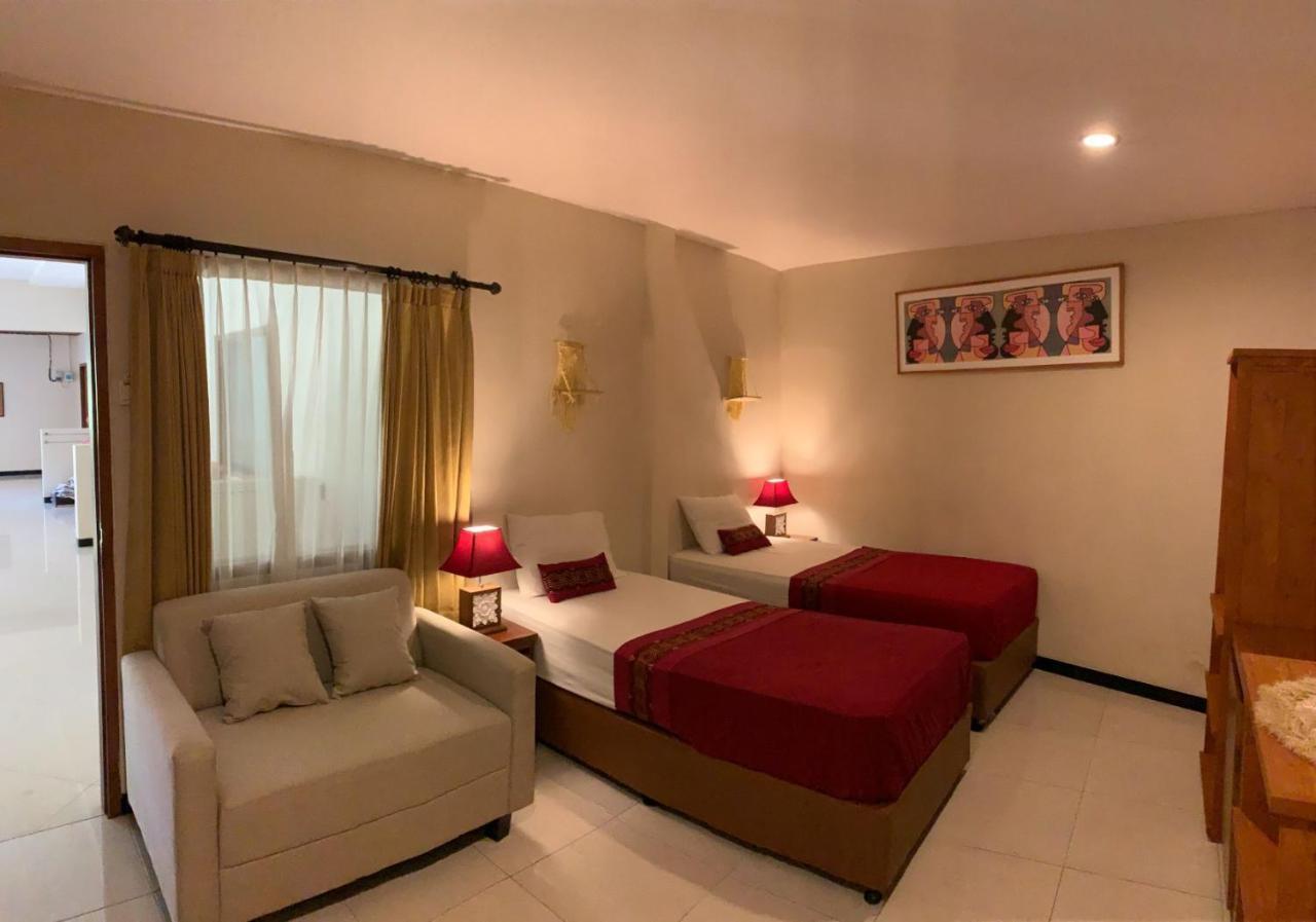 Kuta Suci Guest House Extérieur photo