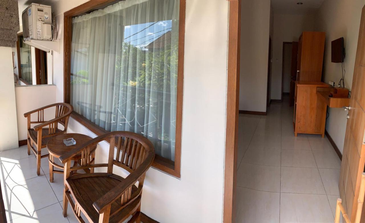 Kuta Suci Guest House Extérieur photo