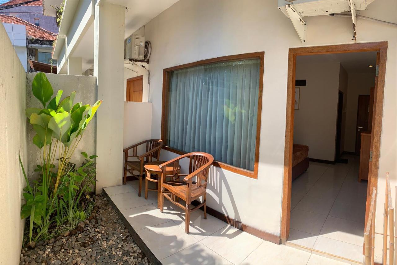 Kuta Suci Guest House Extérieur photo