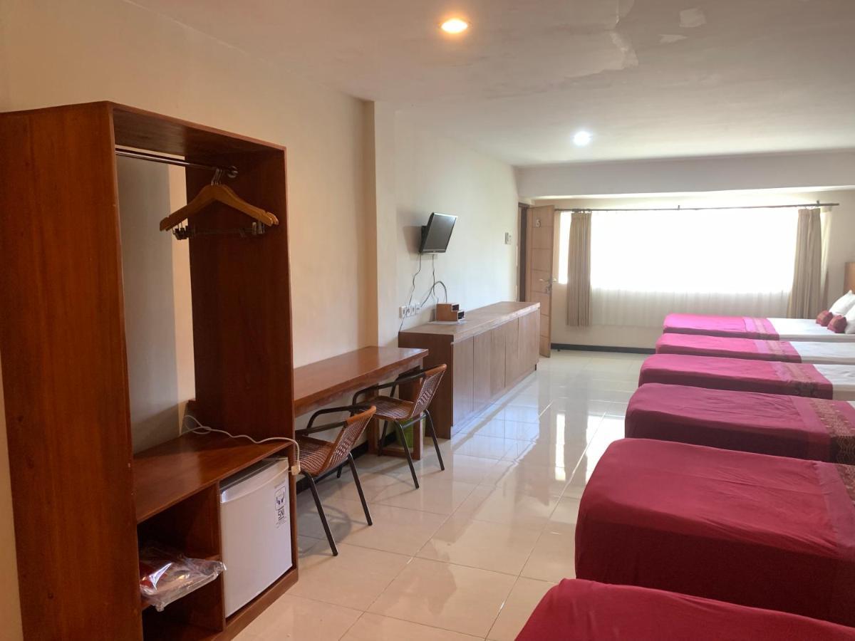 Kuta Suci Guest House Extérieur photo