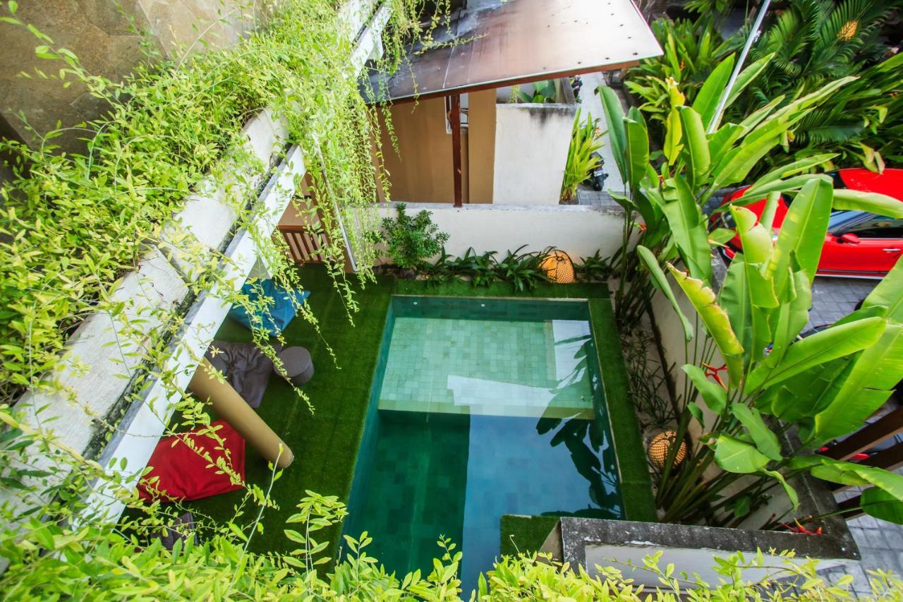 Kuta Suci Guest House Extérieur photo