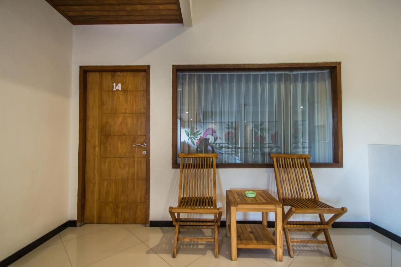 Kuta Suci Guest House Extérieur photo