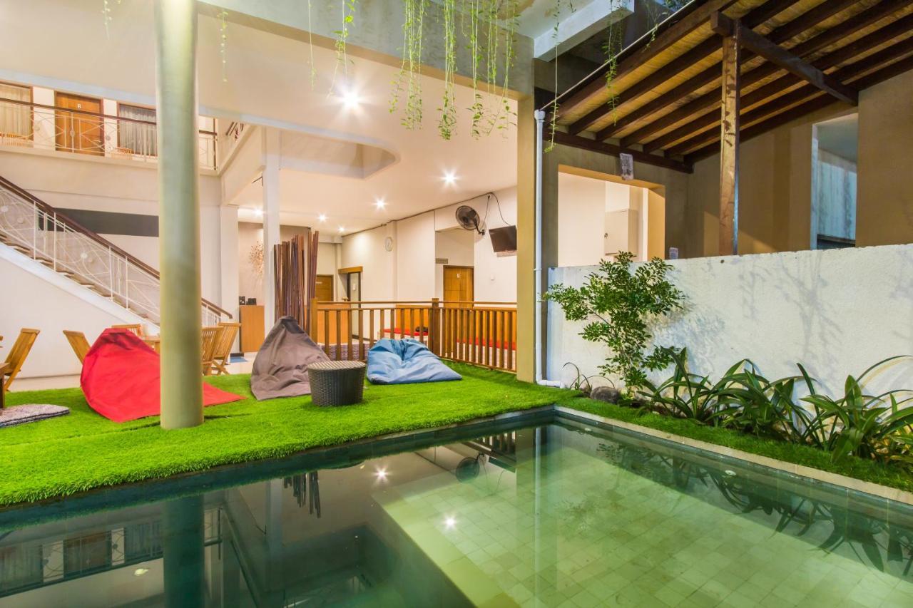 Kuta Suci Guest House Extérieur photo